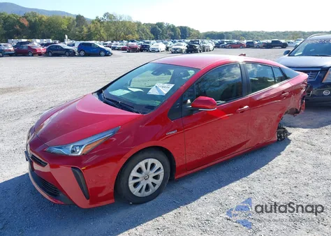2021 Toyota Prius L Eco z USA, uszkodzony, nr VIN JTDKAMFUXM3133862